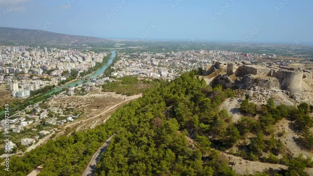 Ruin Medieval Castle and Turquoise color Goksu River, Silifke, Turkey Ruin Medieval Castle and Turquoise color Goksu River, Silifke, Turkey
