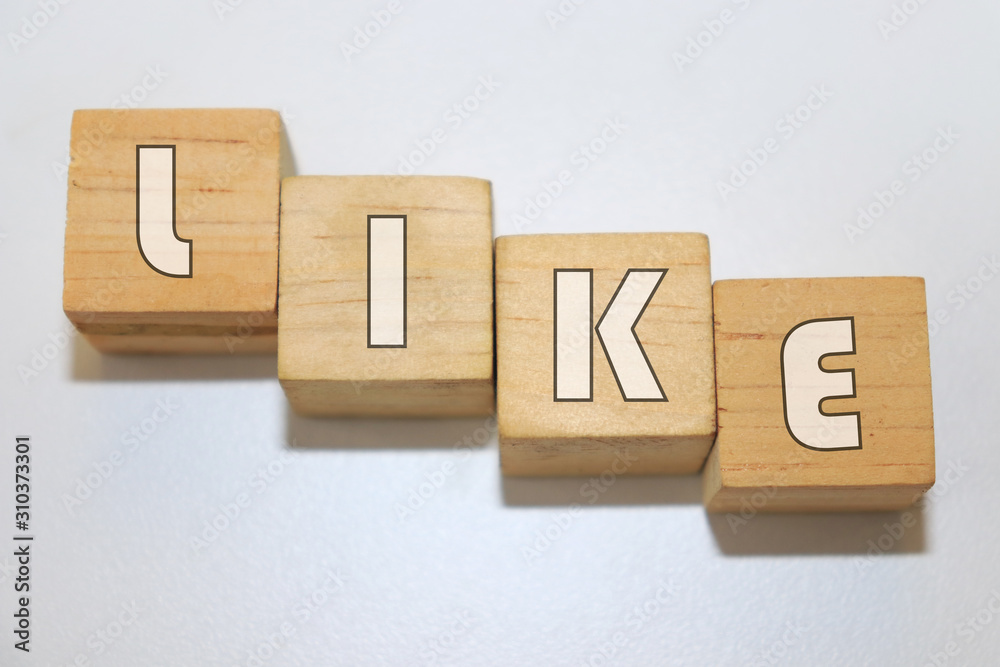 LIKE word made with building blocks isolated on white LIKE word made with building blocks isolated on white