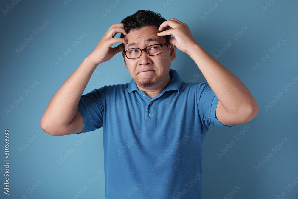 Stressed Young Man Having Pain of Headache Stressed Young Man Having Pain of Headache
