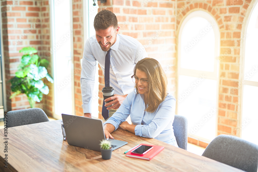 Young business team of woman and man working together at the office Young business team of woman and man working together at the office