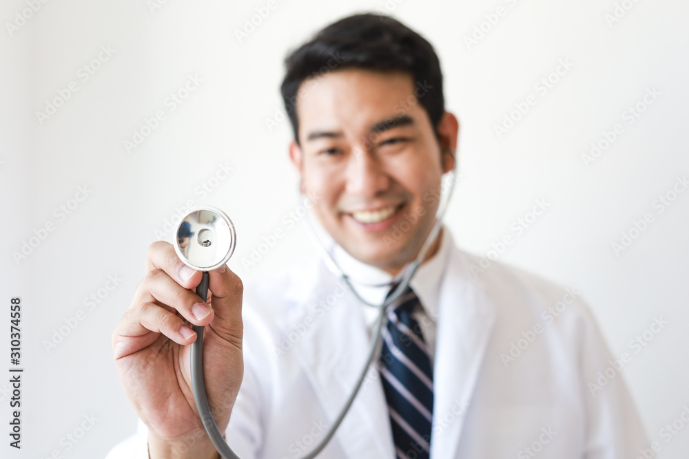 Asian man in Doctor uniform on white background in hospital Asian man in Doctor uniform on white background in hospital