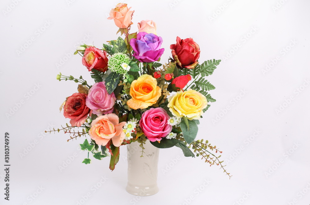 Decorative artificial flowers on white background Decorative artificial flowers on white background