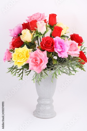 Decorative artificial flowers on white background