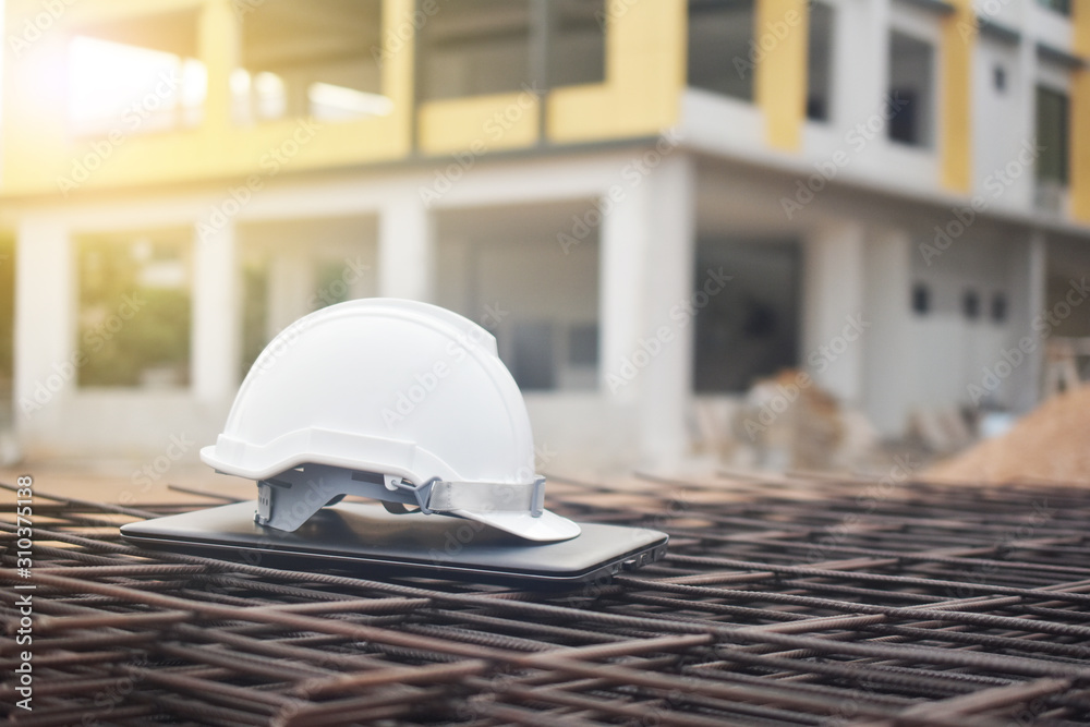 White helmet hard hat safety building estate construction background