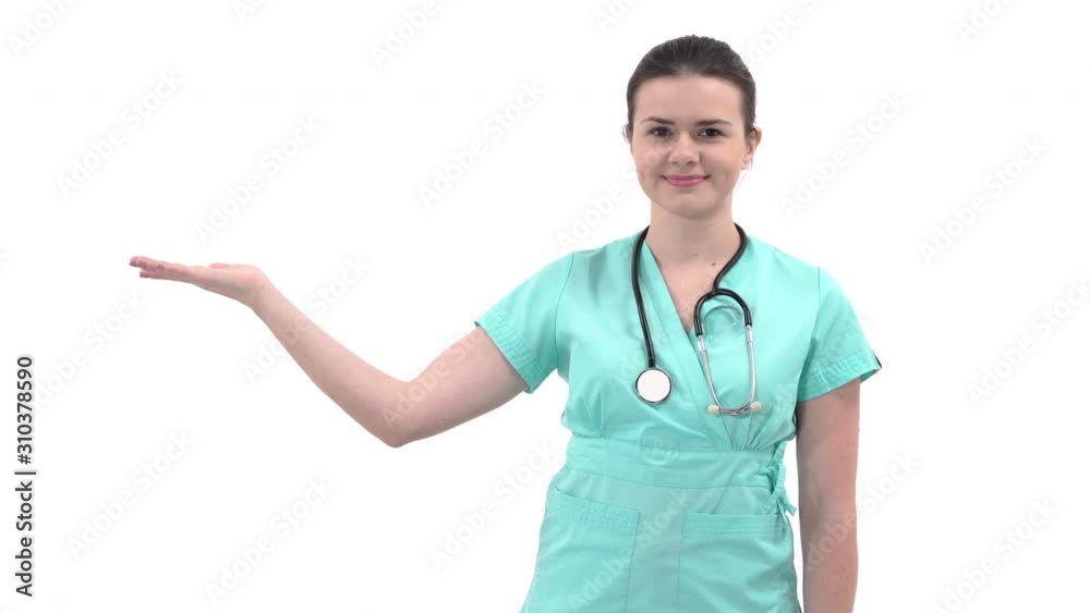 Close-up of a charming female doctor making presenting gesture with hand. Isolated, on white background Close-up of a charming female doctor making presenting gesture with hand. Isolated, on white background