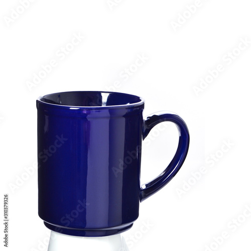 cup or colour ceramic mug on background new.