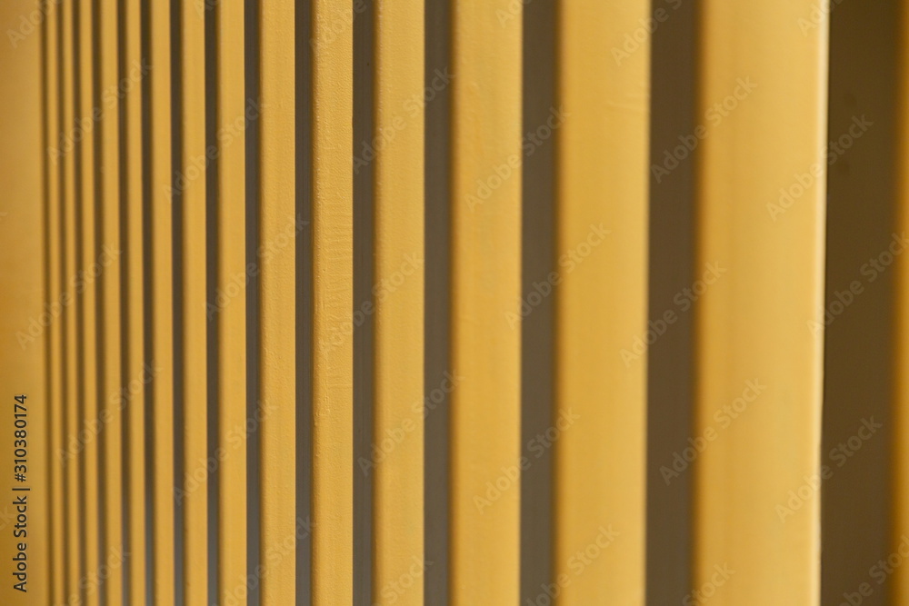 Fototapeta premium soft focus with yellow straight post building at office .