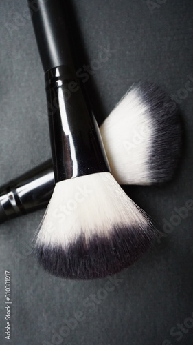 black background makeup brush
