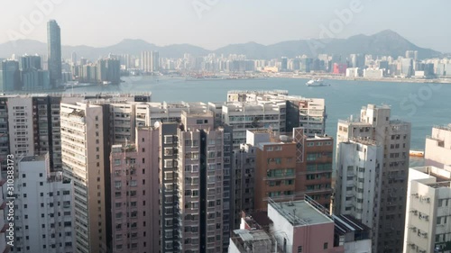 A motion time-lapse shot of Hong Kong apartment buildings area with day to night transition