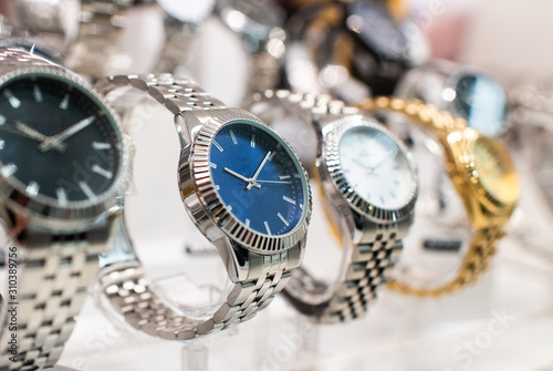 Obraz na plátně Luxurious Watches In A Store Stand