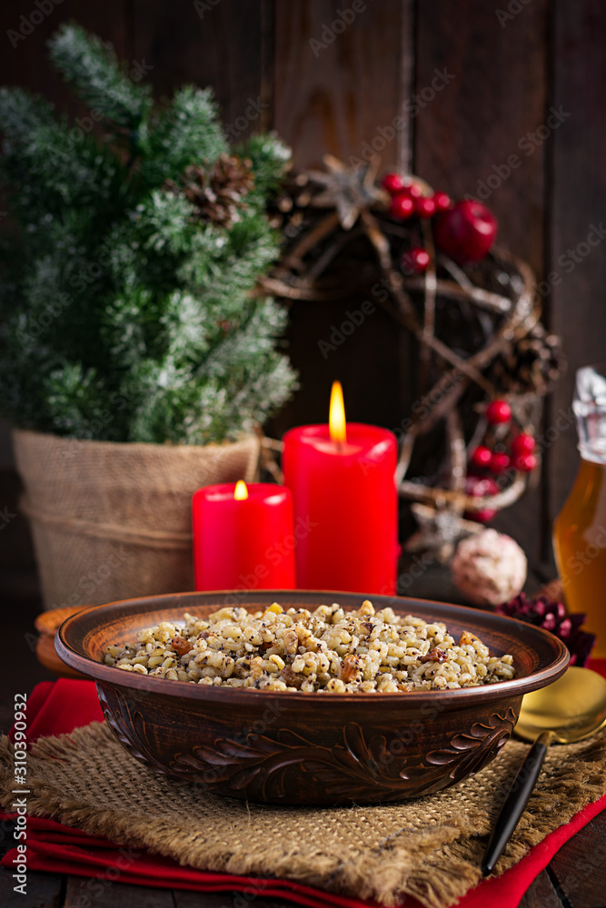 Kutya. Christmas porridge made of wheat grains, poppy seed, nuts, raisins and honey. Christmas kutia. Ukrainian cuisine. Kutya. Christmas porridge made of wheat grains, poppy seed, nuts, raisins and honey. Christmas kutia. Ukrainian cuisine.