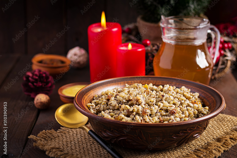 Kutya. Christmas porridge made of wheat grains, poppy seed, nuts, raisins and honey. Christmas kutia. Ukrainian cuisine. Kutya. Christmas porridge made of wheat grains, poppy seed, nuts, raisins and honey. Christmas kutia. Ukrainian cuisine.