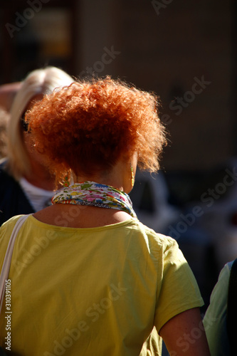 Red hair woman in the street