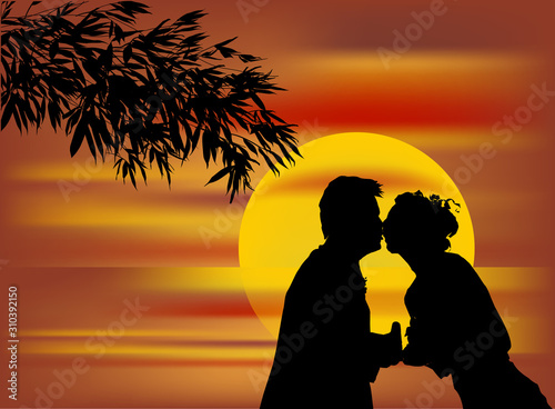 couple near tree branch at red sunset