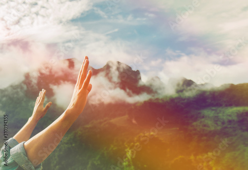 soft focus of Christian worship with raised hand,music concert