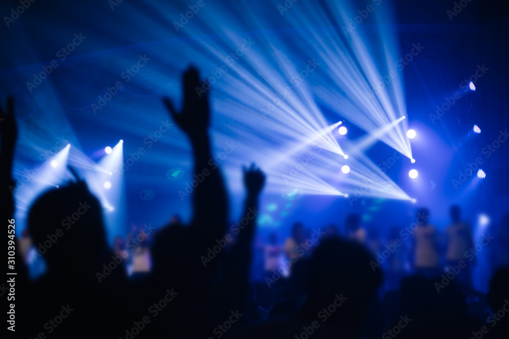 soft focus of Christian worship with raised hand,music concert