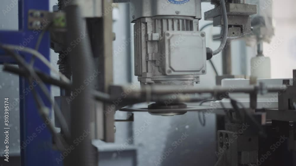Close Shot Of Corner Cleaning Machine in UPVC windows and doors Manufacturing Company Close Shot Of Corner Cleaning Machine in UPVC windows and doors Manufacturing Company