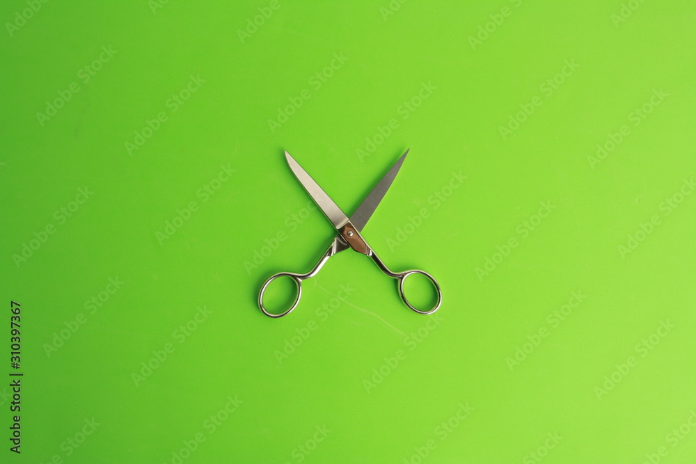 sewing scissors on colorful background