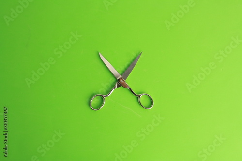 sewing scissors on colorful background