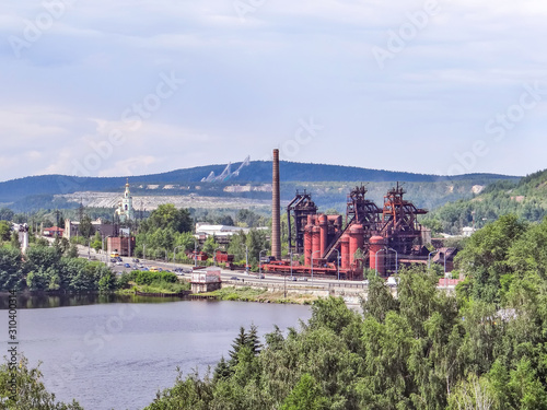 Top view on the symbols of the city - Plant them. Kuibyshev (Demidovsky) and the tower on the top of Fox Mountain. Nizhny Tagil. Sverdlovsk region. Russia