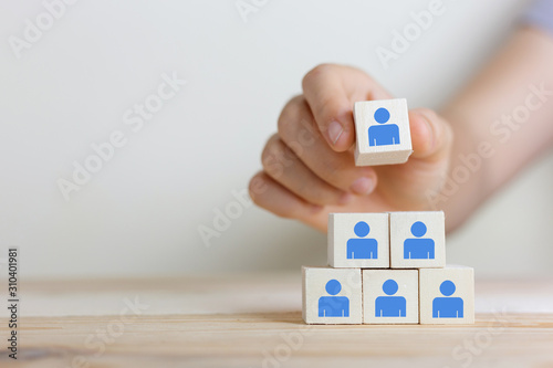 Hands working woman Human resources, social networking, assessment center concept, personal audit or CRM concept - recruiter complete team by one person.