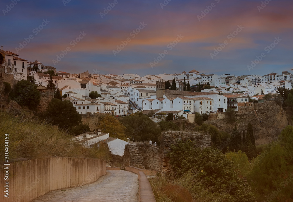 Sunset sky scene of Ronda in Spain old town cityscape on the Tajo Gorge