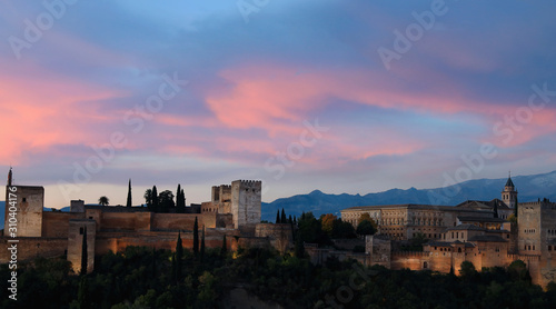 Panoramic view sunset sky scene at Ancient arabic fortress Alhambra, Granada, Spain, European travel landmark