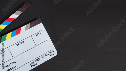 Clapperboard or clap board or movie slate .It is use in video production ,film, cinema industry on black background.