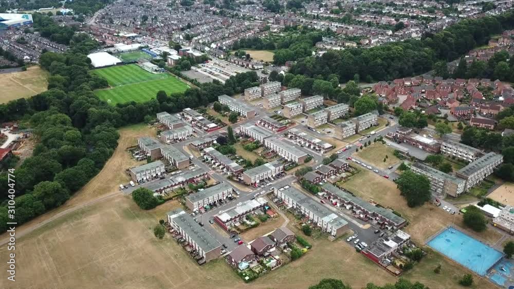 Aerial drone shot over a UK council estate.
