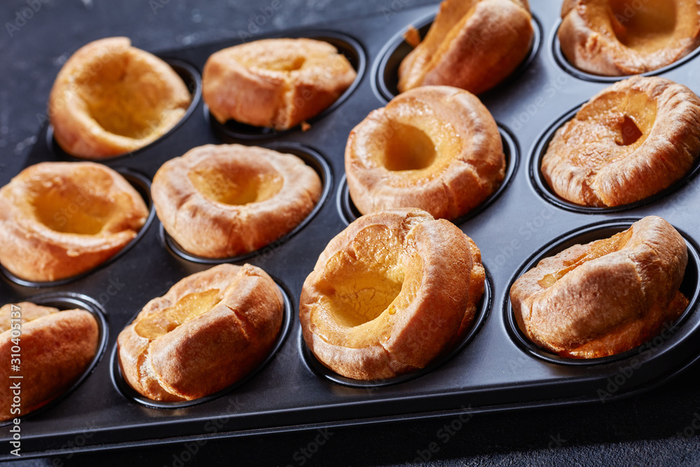 close-up of Yorkshire puddings in a baking tray