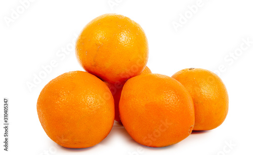 Pile of ripe oranges isolated on white background