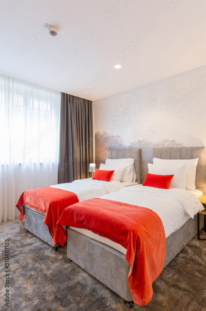 Fototapeta premium Interior of a double bed hotel bedroom