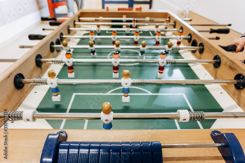Table football game with red and blue players. Football game.