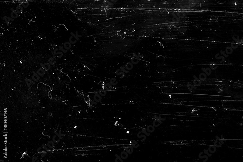 white scratches on a black background. grunge