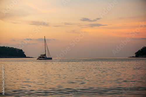 Beautiful boat on Kata beach in Thailand on Phuket. Beautiful sunset. © Ruben