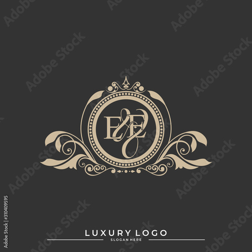 Logo Initial letter EE luxury vector mark, gold color classical symmetric curves decor. editable file eps10.