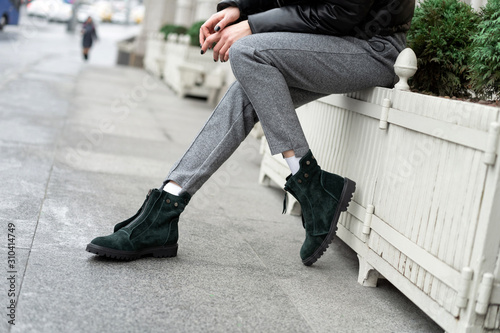 real-life green womens low boots nubuck demi season flat shoes on legs of a model in the street