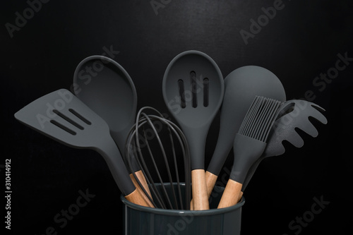 Kitchen utensils, home kitchen tools, mint rubber accessories on dark  background. Restaurant, cooking, culinary, kitchen theme. Silicone spatulas  and brushes Stock Photo by ©Magryt_Artur 441739308