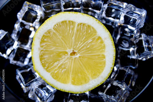 Lemons inside ice in a bowl