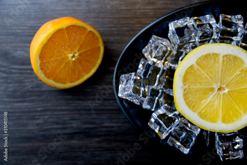 Lemons inside ice in a bowl