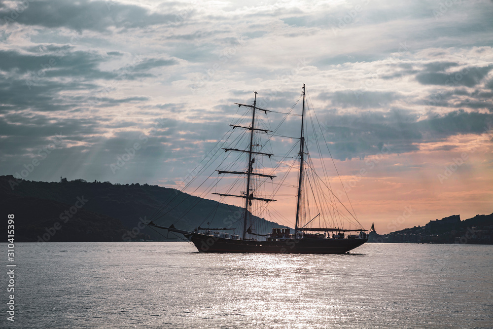 sail yacht at sunset