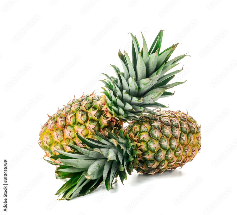 Fresh ripe pineapples on white background Fresh ripe pineapples on white background