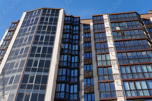 Modern condominium building real etate in city with blue sky