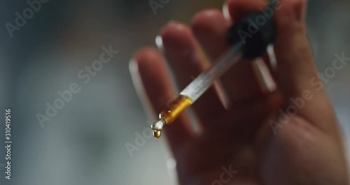 Wallpaper Mural Close up of a professional bartender is preparing an alcoholic cocktail with ice cubes to customers at the bar or disco club. Torontodigital.ca