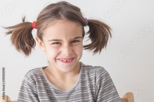 Little kid making a funny face