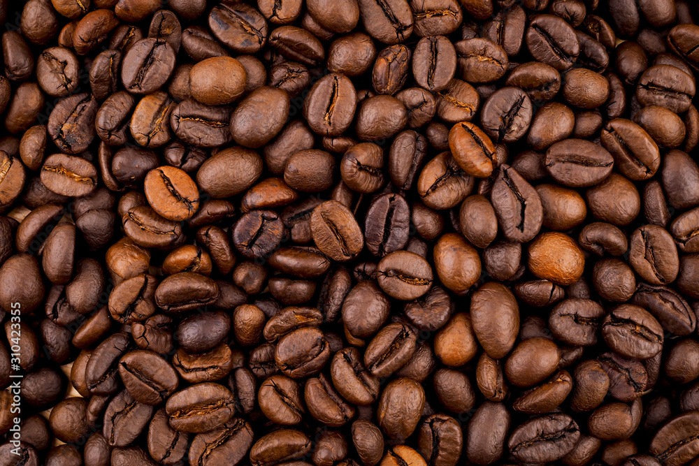 Roasted coffee beans texture used as a background Roasted coffee beans texture used as a background