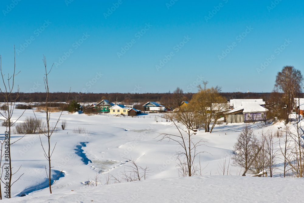 Winter landscape with a view of a typical small russian village Luh/ Ivanovo region/ Russia/ Winter landscape