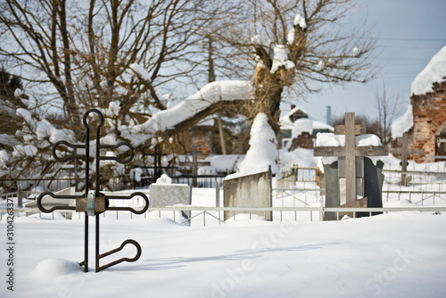 Orthodox cemetery/ Winter/ Graves/ Cross.