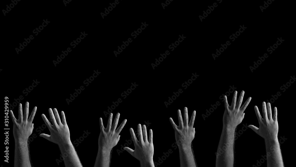 Many male hands stretching to the top. Stretching hands on a black background. Many male hands stretching to the top. Stretching hands on a black background.