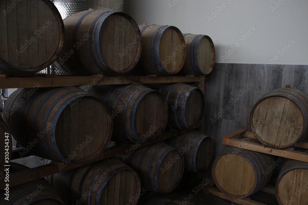Wine barrels piled on a room